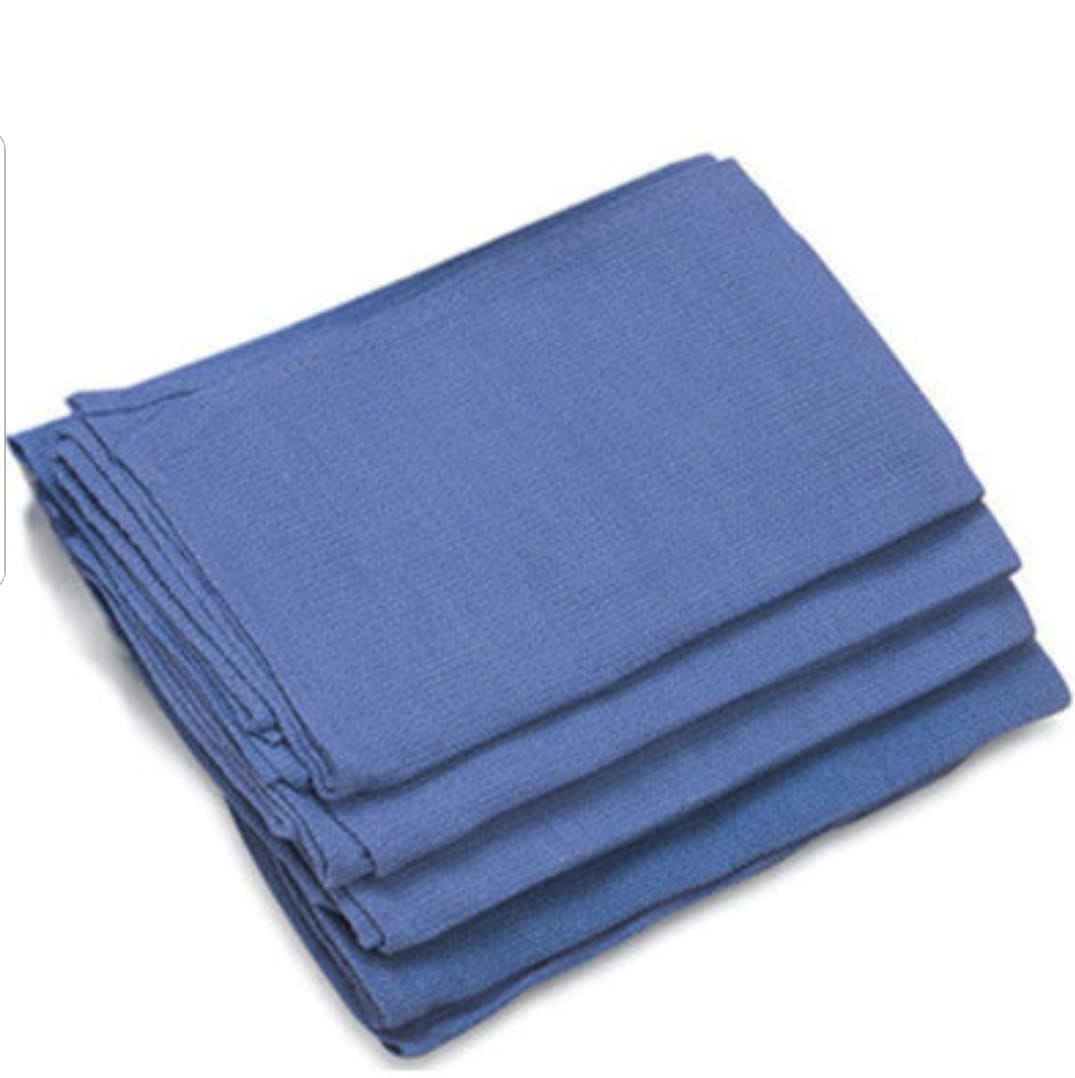 Folded blue bed sheets